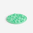 Green silicone slow feeding insert on a white background