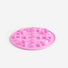 Pink silicone slow feeding insert on a white background