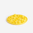 Yellow silicone slow feeding insert on a white background